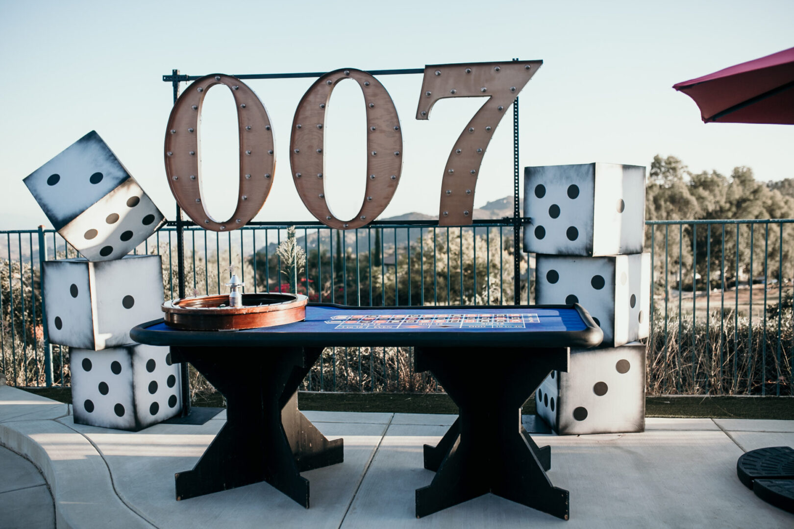 A table with two dice on it and a number 0 0 7.