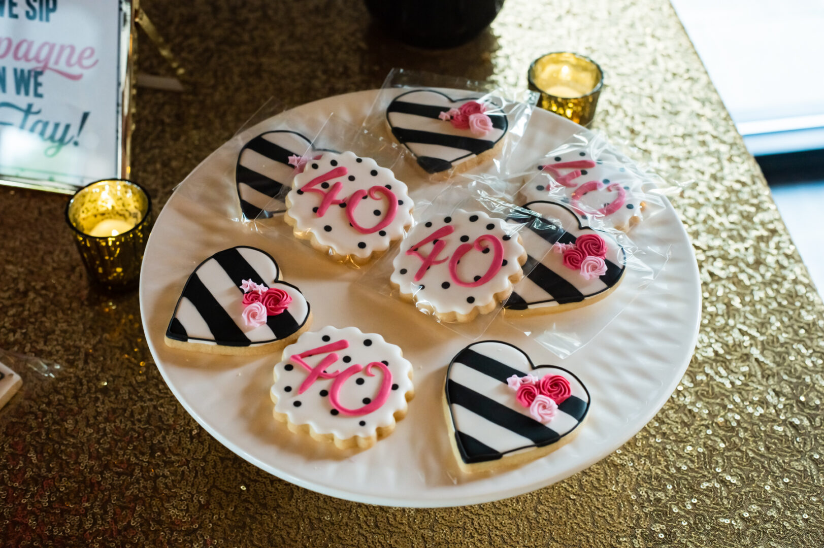 A plate of cookies with the number 4 0 on them.