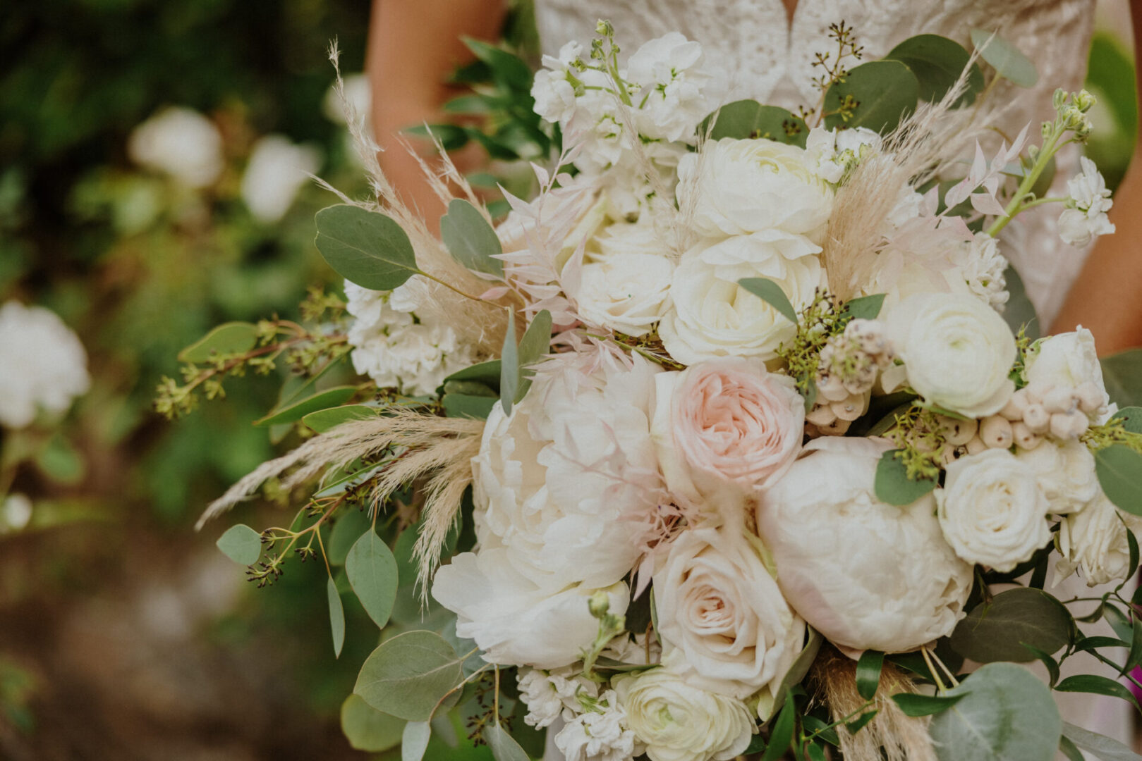 A bouquet of flowers is shown in front of the camera.